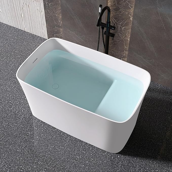 47" Stone Resin Freestanding Bathtub, Freestanding Bathtub with seat,Oval Solid Surface Japanese Soaking Bathtubs with Drain & Integrated Slotted Overflow Matte White MG003-1200